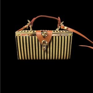 Little lock box crossbody bag with a mirror in it